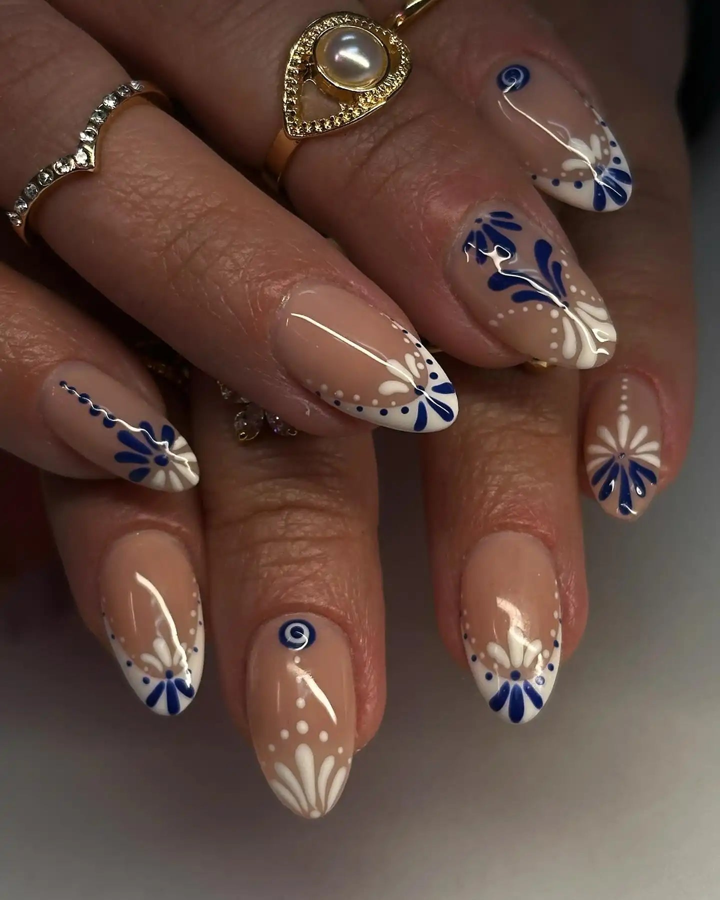 White Nail Art with Floral Flair