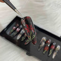 Handmade Spring Spider Lily Press On Nails - Elegant Red & Black Design.