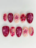 Handmade 3D press-on nails with pink floral, orchid, lily, and rhinestone accents