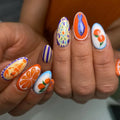 Handmade Mediterranean press-on nails with artistic seafood, citrus, and floral designs.
