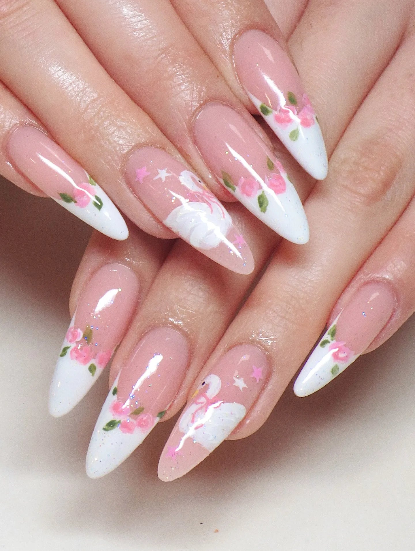 Handmade press-on nails with white swan, pink rose, balletcore floral and star designs.