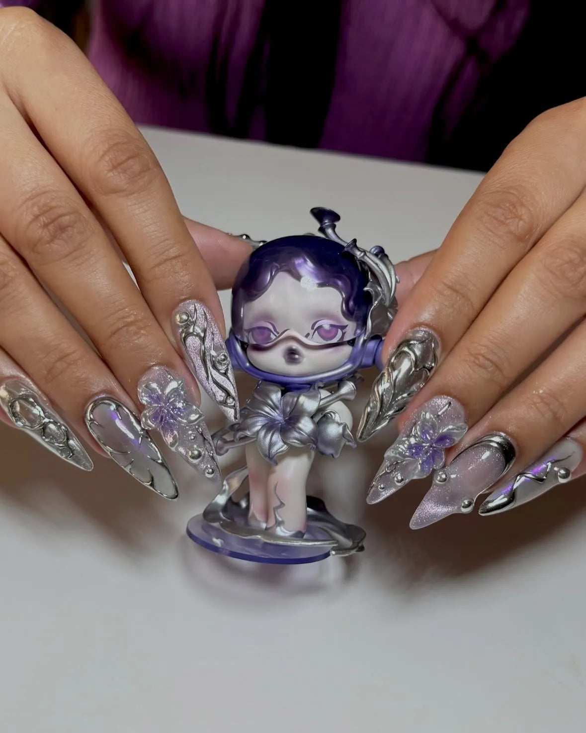 Chrome purple 3D metallic flower stiletto press-on nails with decorative doll figure