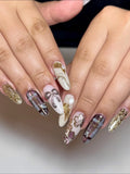 Handmade press-on nails with dark tartan plaid, gold metallic bows, and floral accents.