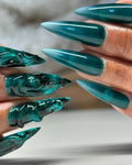 Handmade emerald green stiletto press-on nails with 3D sea glass jelly texture