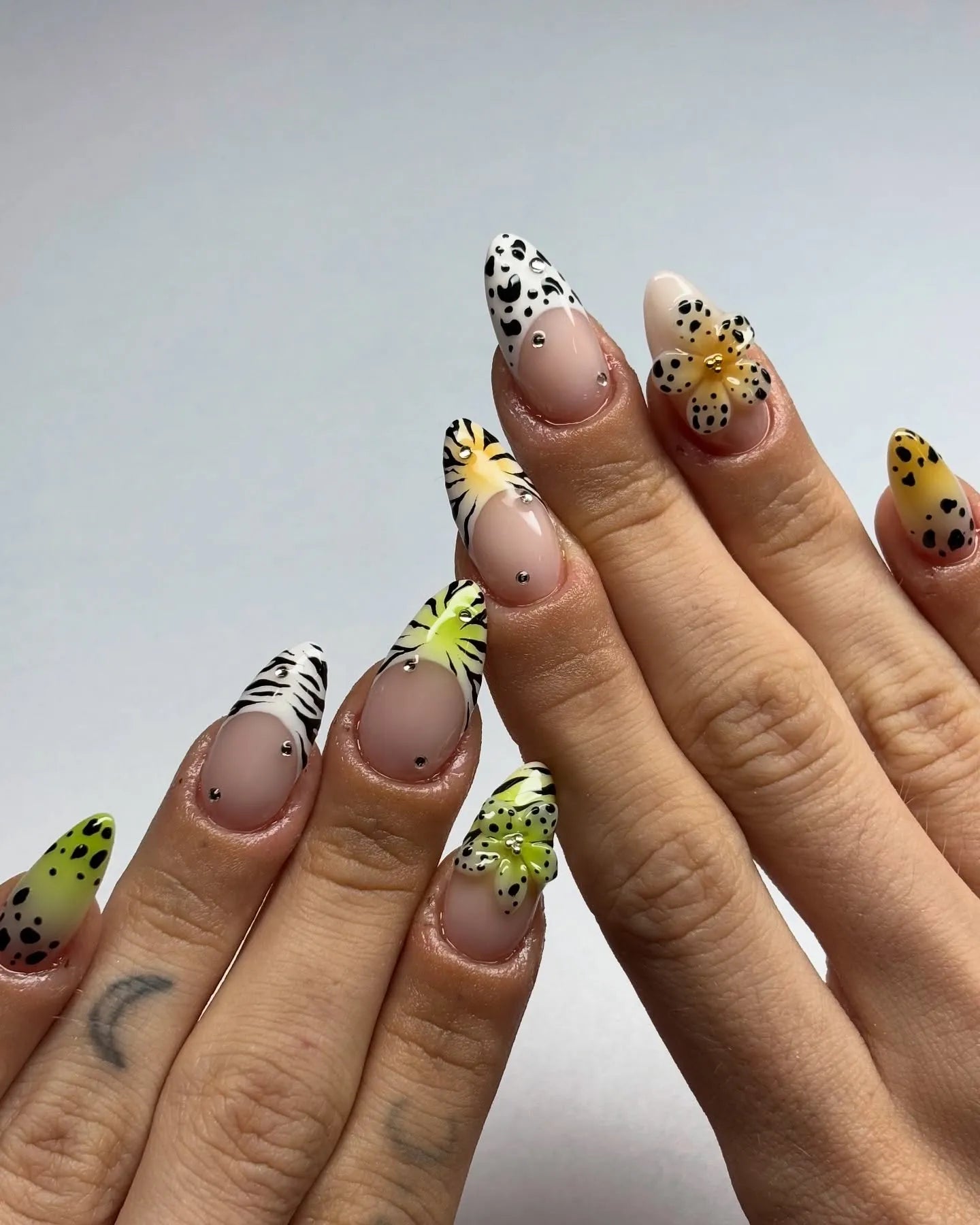 Handmade press-on nails with floral, leopard, zebra French tips and crystal accents