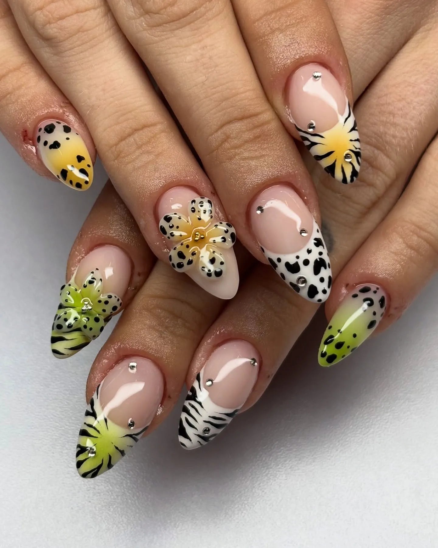 Handmade press-on nails with floral, leopard, zebra French tips and crystal accents