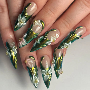 Handmade press-on nails with green and gold chrome 3D flower designs and sculptural petals