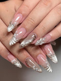 Handmade iridescent shell 3D pearl French tip press-on nails with elegant, glossy finish.