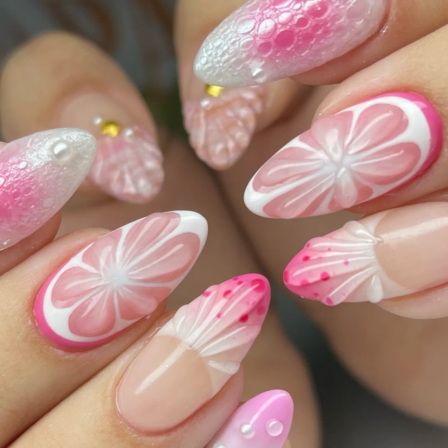 Handmade pink 3D citrus blossom pearl press-on nails with floral and textured designs