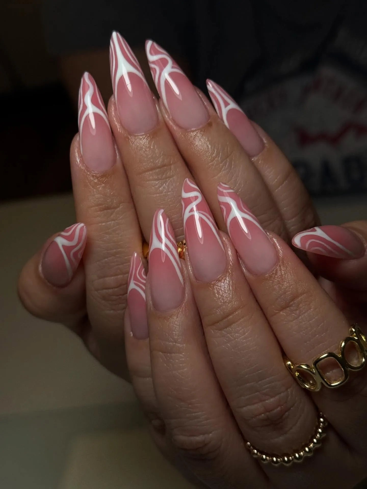 Handmade pink swirl abstract French tip press-on nails with Y2K aesthetic design