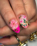 Handmade press-on nails with 3D pink flowers, gold caviar beads, and green floral accents