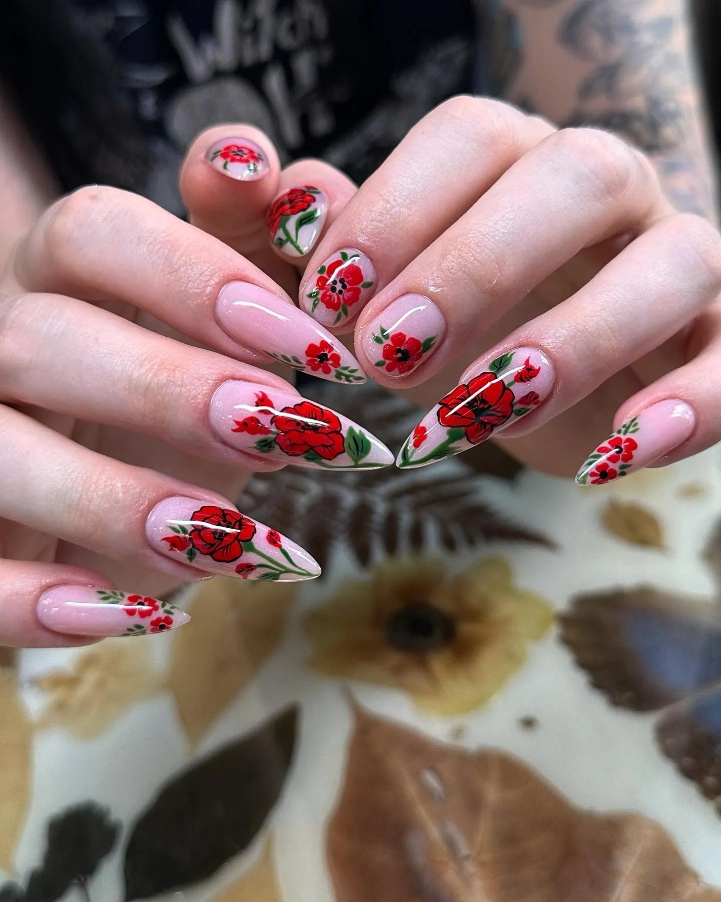 Handmade long stiletto press-on nails with red poppy floral garden design