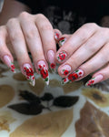 Handmade long stiletto press-on nails with red poppy floral garden design