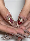 Handmade press-on stiletto nails with 3D fruit, gemstone accents, and golden filigree details