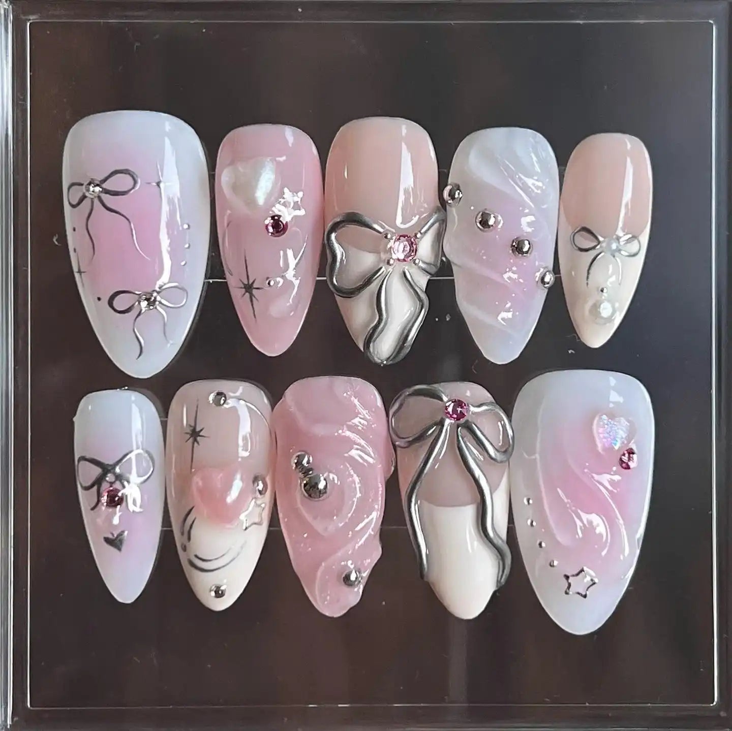 Handmade Silver Ribbon in Pink Background Press on Nails U21