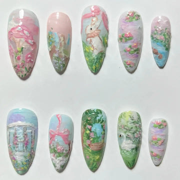 Handmade press-on nails with spring garden, bunny, pastel flowers, and romantic landscape art.