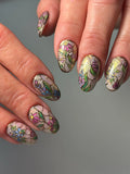 Handmade press-on nails with stained glass floral design, multicolored flowers and gold outlines