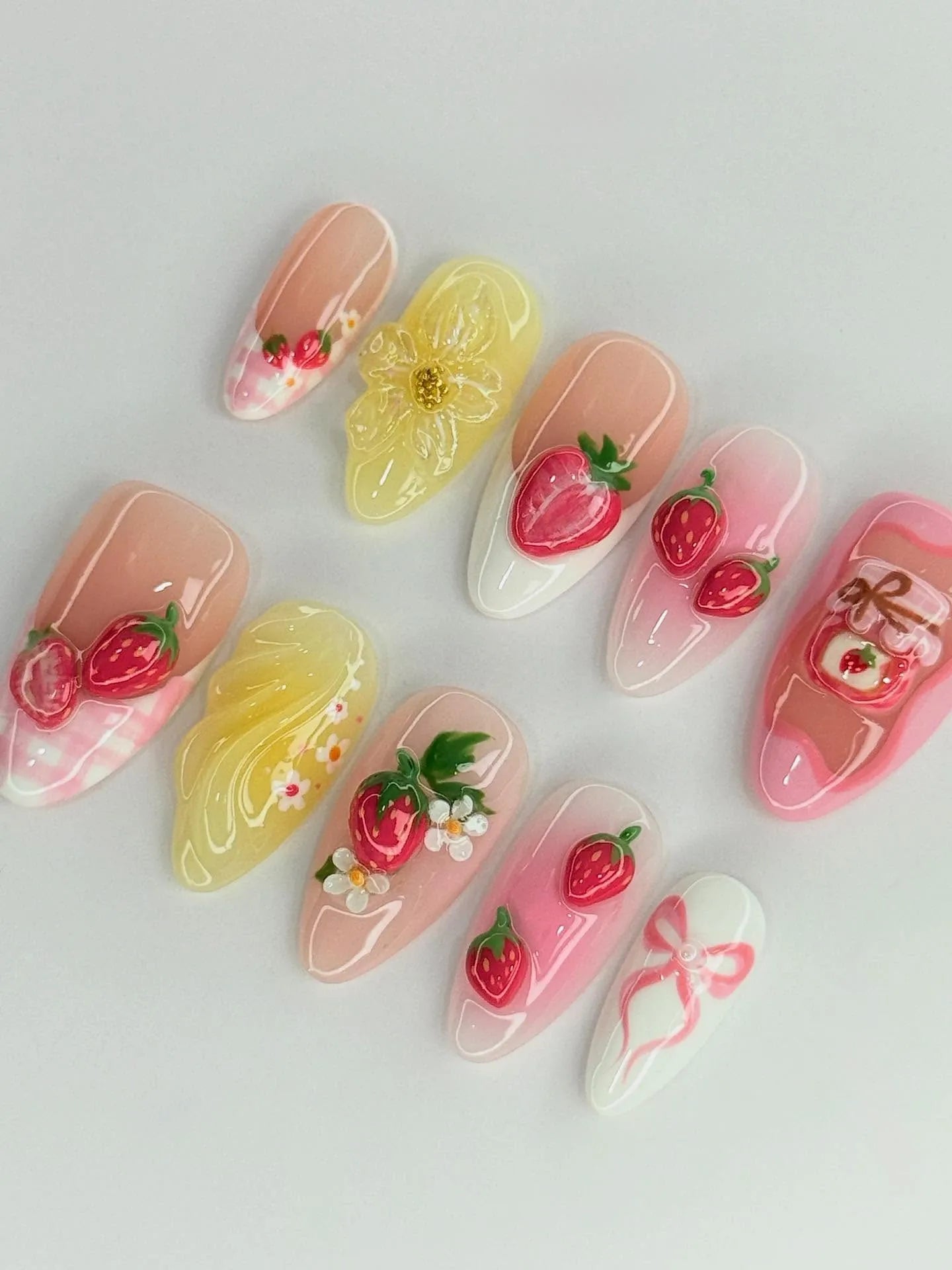 Handmade press-on nails with 3D strawberries, flowers, gingham and ribbon designs