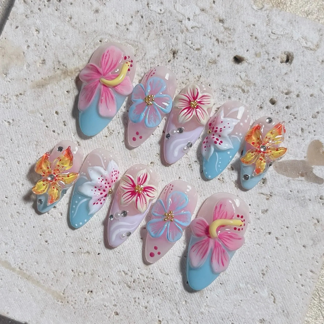 Handmade press-on nails with 3D tropical hibiscus and bright summer floral designs