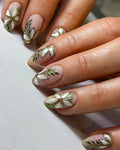 Handmade press-on nails with white pearl floral and green metallic leaf botanical design