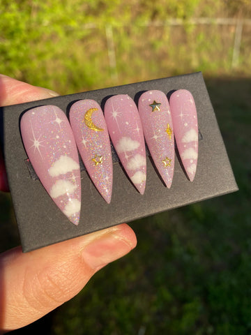 Pinky Sky Press on Nails with White Clouds Gold Moon and Stars Design